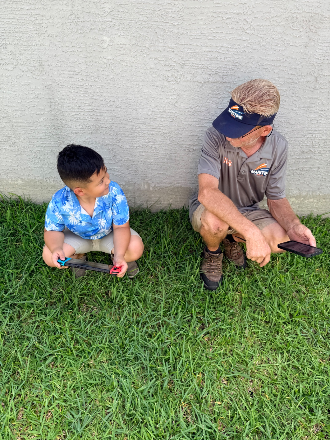 Maritime Air Co. owner with his son on a service call