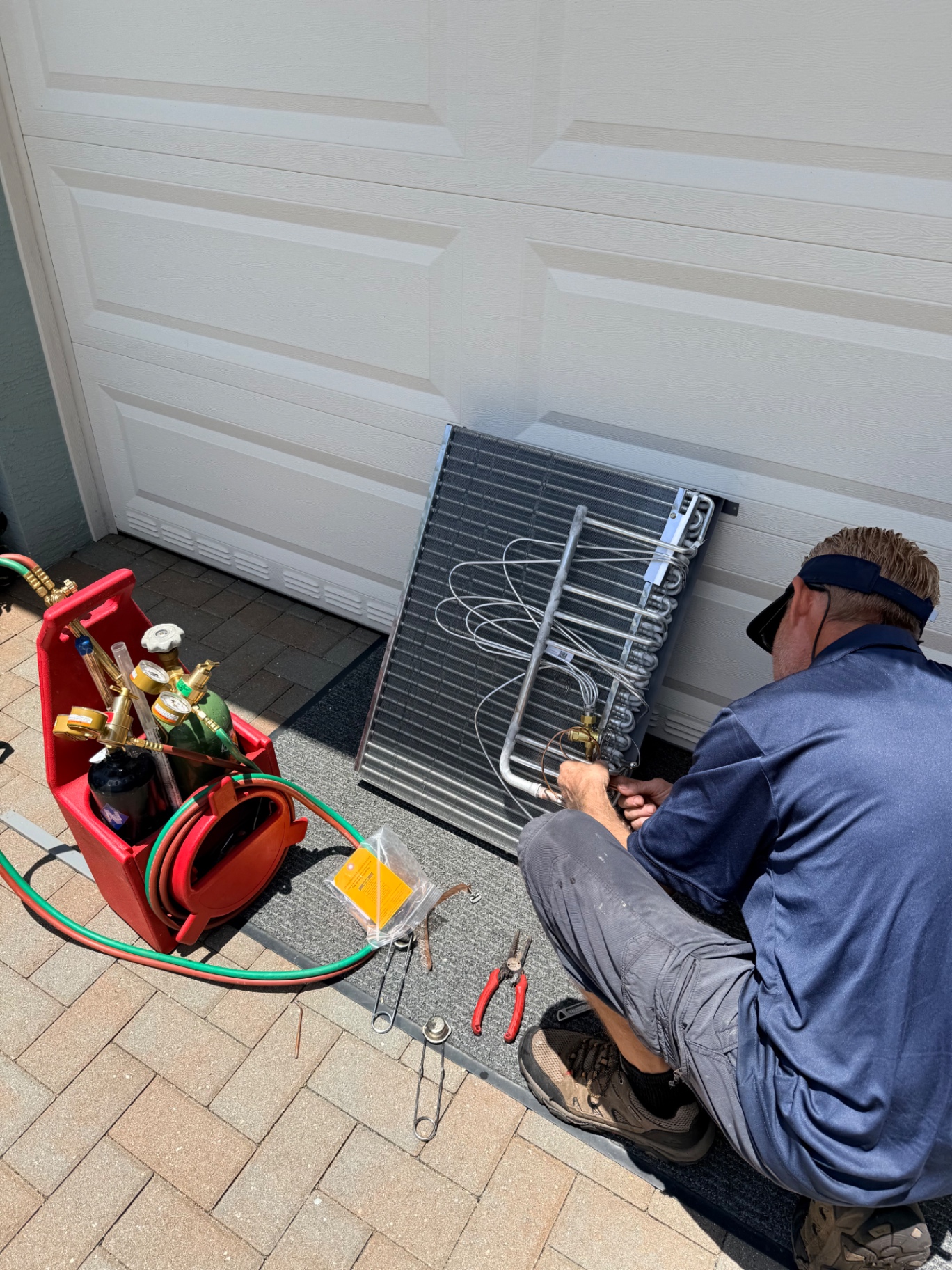 Brazing replacement evaporator coil with oxy-acetylene torch setup