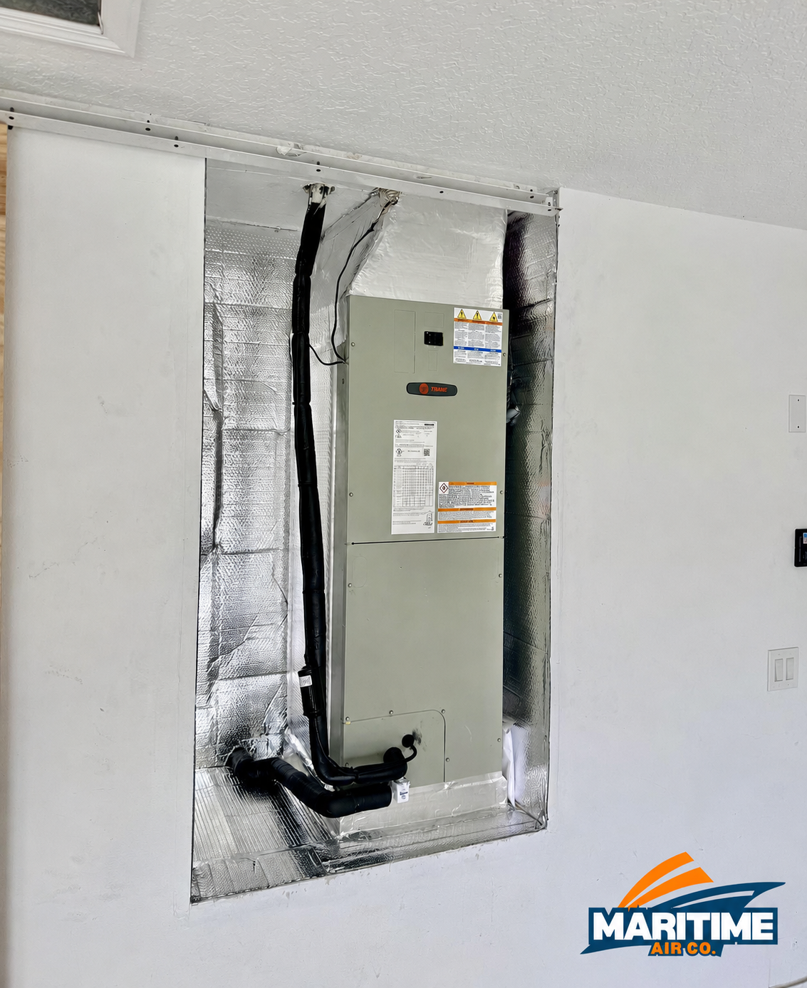 New Trane air handler installed in an interior closet with insulated plenum in Port St. Lucie, FL