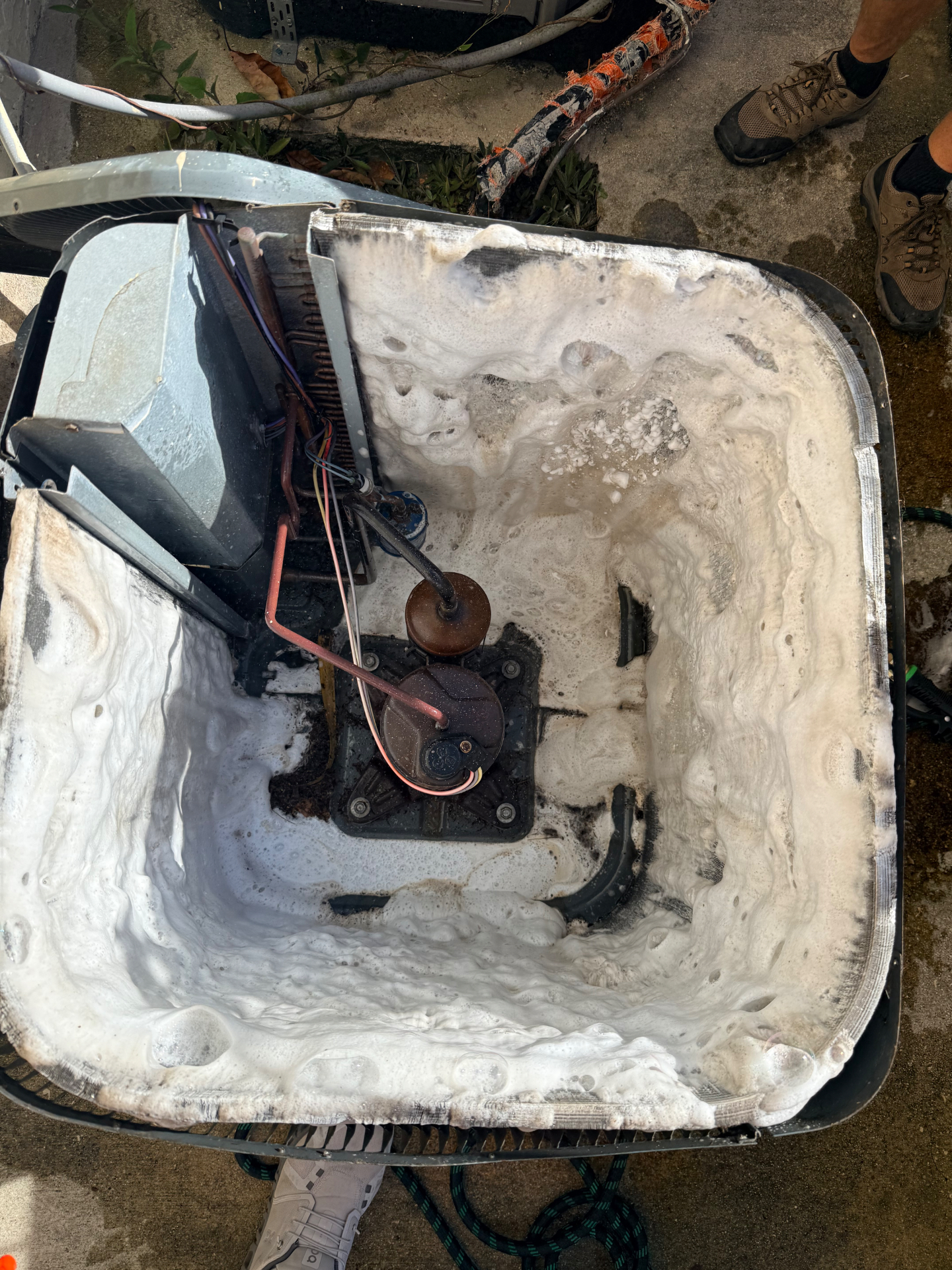 Top-down view of a foamed condenser coil during a Maritime Air Co. tune-up