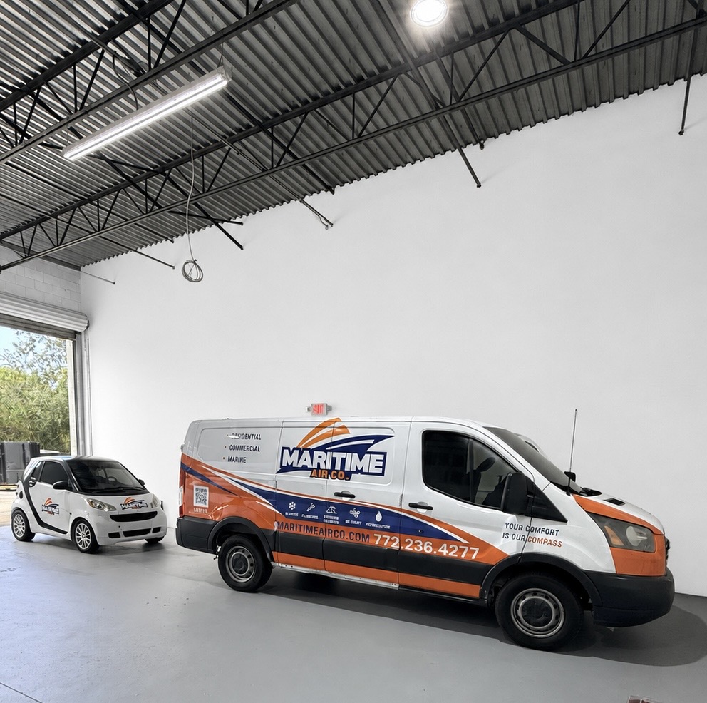 Maritime Air Co. service van and fleet vehicle inside the company warehouse, ready for Treasure Coast HVAC calls